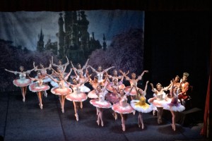 The first act of Sleeping Beauty features senior –level dancers as they are en pointe,  raised towards  the audience, welcoming the birth of Princess Aurora, as the King and Queen applaud their performance. 