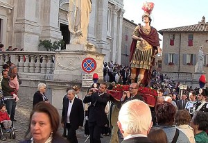 The procession honoring the Patron Saint starts immediately as the Mass ends and proceeds through the town of Urbino.