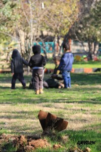 Undetonated explosives, like this one in a children’s park, litter Kobane.