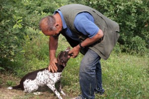 Vittorio Scalbi gives Luna a warm congratulations for finding a truffle in the woods on her own. 