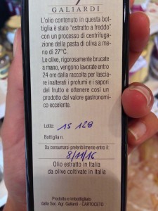 This bottle of olive oil states that it is produced and bottled in Cartoceto. 