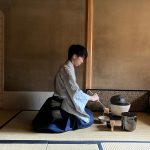 Takaki Tada cleans a chawan with boiling water, initiating a traditional tea ceremony at Onishi Tsune Shoten in Kyoto. Photo taken by Angeles Maku.