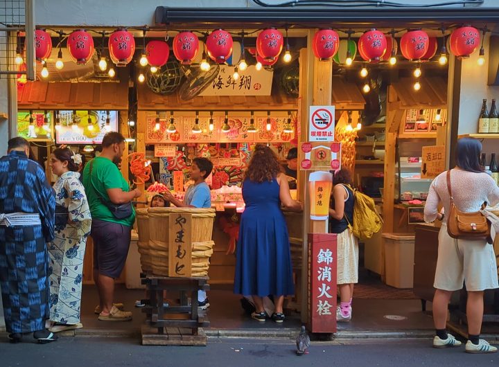 Tourists crowd into a Nishiki Market stall in a photo by Ben Lyle.