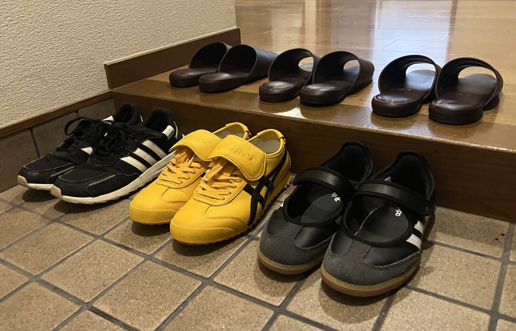Shoes and slippers at modern Genkan in Airbnb in Osaka, Japan on June 19, 2026. (Photo by Makayla MAHONEY)